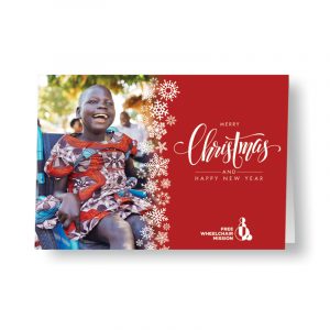 2020 Free Wheelchair Mission Christmas Card featuring a young woman from Uganda.