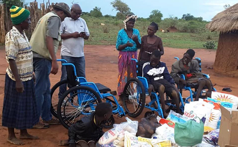 A wheelchair distribution in Rutenga, Zimbabwe