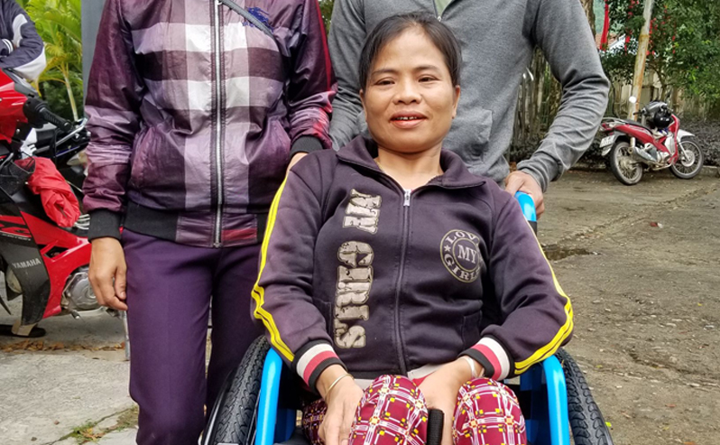 Thi, a woman who received a new wheelchair in Vietnam