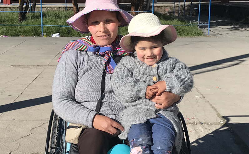 Rocio, a young mother, receives a new wheelchair in Peru.