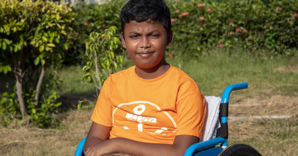Samuel, a 14-year-old boy in India who received a new wheelchair