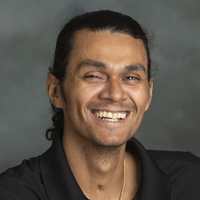 Headshot of Cesar Flores.